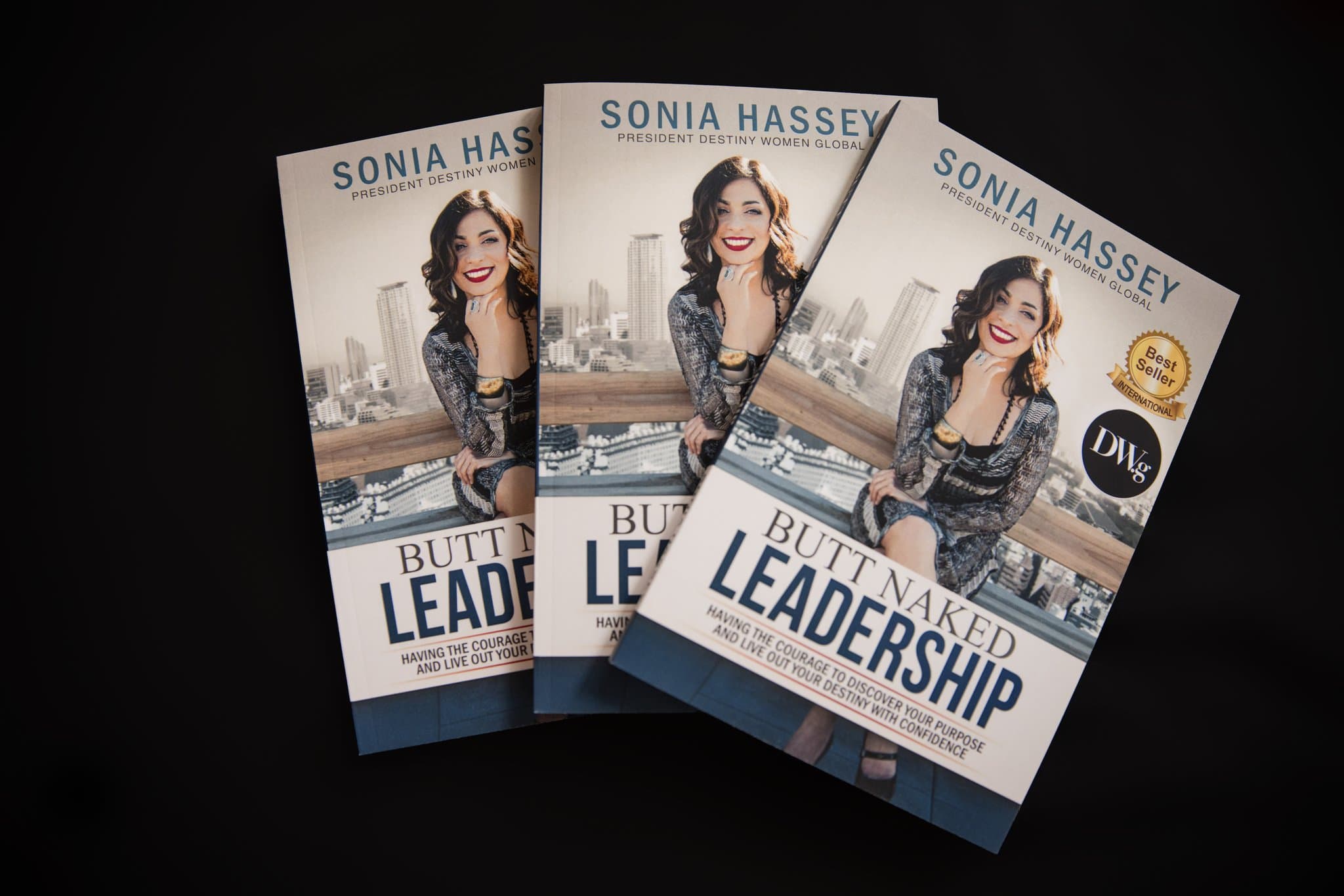 Three copies of Sonia Hassey's book Butt Naked Leadership